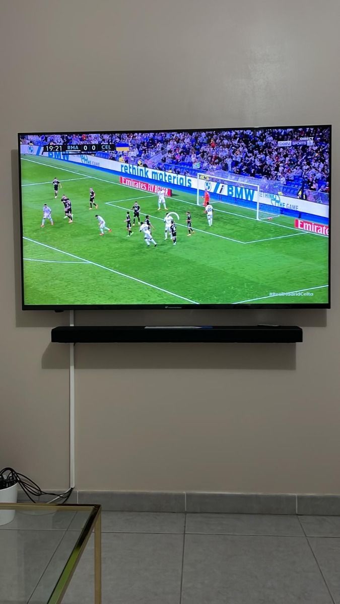 Customer review photo showing multi-screen TV setup